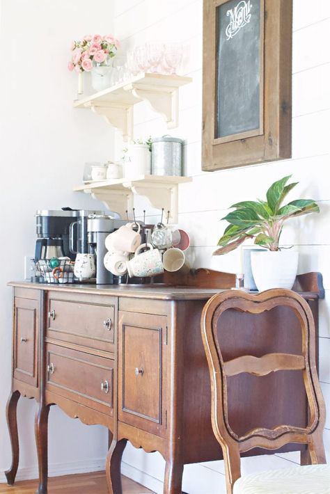 Coffee is very important in our home. So, we needed an area dedicated to our vital morning brew. This coffee bar refresh did the trick! Coffee Bar Traditional, Coffee Bar Sitting Room, Shelving Above Coffee Bar, Traditional Coffee Bar Ideas, Vintage Buffet Coffee Bar, Mirror Above Coffee Bar, Coffee Bar Cottagecore, Antique Dresser Coffee Bar, Grand Millennial Coffee Bar