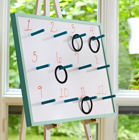 How to build a game board w/ pegs for ring toss  use the other side as a dry erase board.  Idea from Lowe's Home Improvement store. Primary Chorister, Carnival Circus, Primary Singing Time, Ring Toss Game, Indoor Games For Kids, Lds Primary, Ring Toss, Singing Time, Toss Game