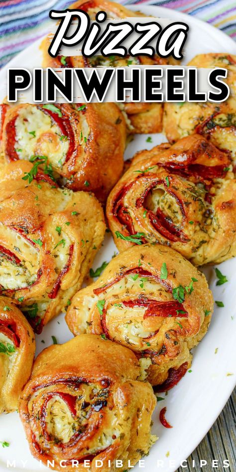 Super easy and delicious pizza pinwheels are the perfect Super Bowl Sunday appetizer, game day snack, or even just a nice appetizer that's not related to football. These pinwheels are super easy to make and are filled with all the best pizza flavors that we all love. Pizza pinwheels are made with canned crescent rolls, pepperoni, pizza sauce, and mozzarella cheese. They're perfect for a quick snack or appetizer and are sure to become fast favorites. Try them today! Pinwheel Dinner Recipes, Snack Board Dinner, Appetizer Meals Dinners, Pepperoni Pinwheels Crescent Rolls, Simple Summer Recipes Dinner, Pepperoni Rolls With Crescent Rolls, Crescent Roll Pizza Rolls, Crescent Roll Pinwheel Recipes, Pizza Pinwheels Crescent Rolls