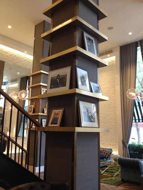 Shelves surround column, photo display...love Pillar In Living Room, Column In Living Room, Columns In Living Room, Column Design Interior, Pillar Design Interior, Indoor Columns, Column Decoration Ideas, Interior Pillars, Columns Interior