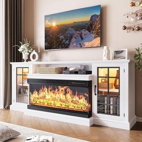 Linear fireplace with tv above