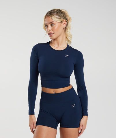 - Shop now!

The Gymshark Everyday Seamless Long Sleeve Crop Top is a must-have for any fitness enthusiast. It's made with a lightweight, breathable fabric that will keep you cool and comfortable during your workouts. The seamless construction prevents chafing, and the long sleeves offer extra coverage. This top is also available in a variety of colors, so you can find the perfect one to match your style.

#gymshark #fitness #workout Gymshark Outfit, Gymwear Outfits, Fitness Wear Outfits, Gymshark Women, Sport Top, Cropped Tops, Long Sleeve Crop, Gym Outfit, Long Sleeve Crop Top