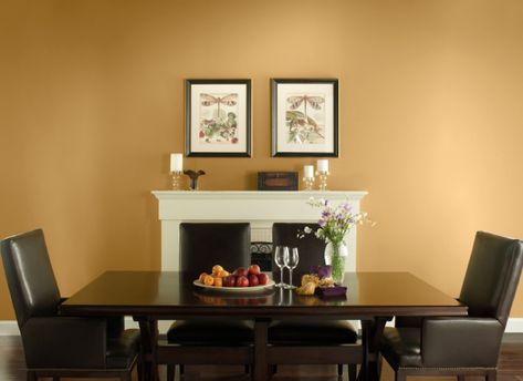 November calls to mind the scent of autumn leaves, a smile outdoors on a sunny day and the excitement of the upcoming holiday season. That’s why Gold Hearted T17-02 is the ideal choice – by name and tint – for our Color of the Month. This soft gold tone evokes a sense of comforting warmth even on the coolest … Gold Paint Behr, Gold Painted Accent Wall, Gold Hearted Behr Paint, Behr Gold Hearted, Gold Tone Wall Paint, Orange Painted Walls Living Room, Gold Interior Paint Colors, Gold Color Paint For Walls, Amber Autumn Behr Paint