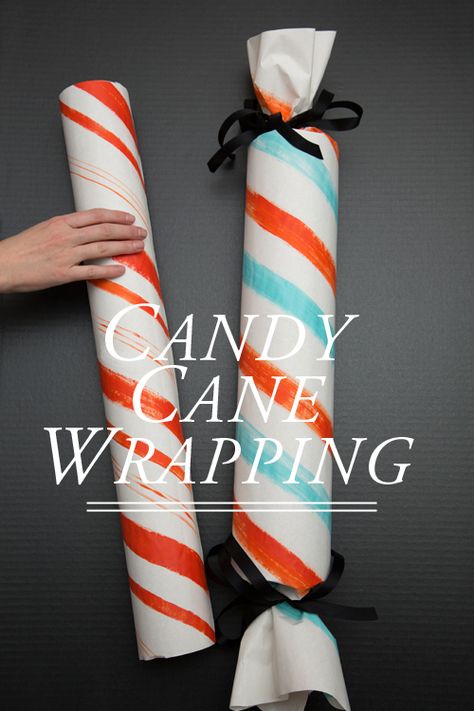 DIY Candycane wrapping via @HouseLarsBuilt | Last minute gift wrap ideas Candy Cane Christmas Wrapping, How To Wrap Tube Presents, Candy Wrapping Ideas Packaging, Candy Gift Wrap, How To Wrap A Gift Like A Candy, Wrapping A Tube Gift, Candy Gift Wrapping Ideas, Built Gifts, Candy Wrapping Ideas