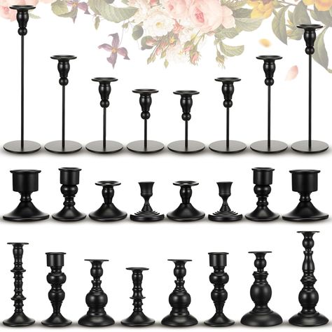 PRICES MAY VARY. Candle Holders Set of 24: this package includes 24 pieces of black candlestick holders in various heights; Ideal for those requiring a large quantity for events or home decorative purposes, it saves you from the hassle of buying individually and offers a mix of classic design candlestick holders to meet your needs; And you can also choose to share it with family, friends or neighbors to create a romantic atmosphere together Elegant Design and Visual Effect: presented in a black Elegant Halloween Table Settings, Gothic Elegance Decor, Dark Academia Wedding Centerpieces, Black Candlestick Holders Wedding, Black Taper Candles Wedding, Black And Silver Decor, Black Tapered Candles Wedding, Goth Wedding Seating Chart, Candle Holders Decor Ideas