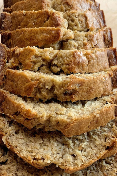 A sliced loaf of perfectly moist banana bread. Moist Dense Banana Bread, Easy Delicious Banana Bread, Banana Bread Recipe With Cinnamon, Banana Nut Bread Recipe Healthy, Best Banana Nut Bread Recipe Moist, Banana Bread Recipe With Mayonnaise, Banana Cinnamon Bread Recipe, Banana Bread 5 Bananas, Mayonnaise Banana Bread