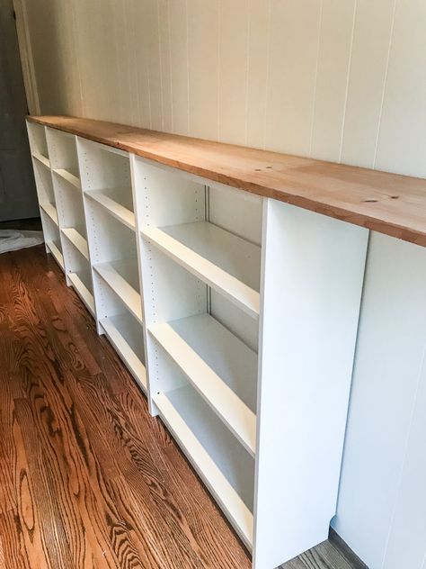 An easy to follow step-by-step tutorial showing how to build bookcase built-ins using IKEA Billy bookcases. #IKEAhack #homeimprovement #build #playroom Diy Built In Playroom Storage, Billy Bookcase Basement, Ikea Play Kitchen Billy Bookcase, Billy Bookcase Hack Playroom, Diy Short Bookshelf, Diy Ikea Shelves, Billy Bookcase Kids Room, How To Build A Bookcase, Ikea Billy Kids Room