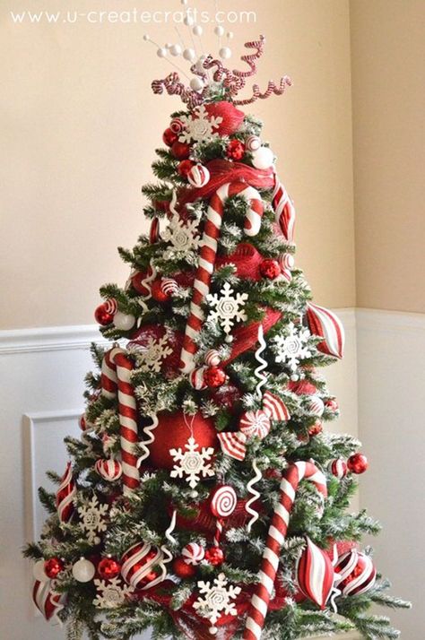 Peppermint Snow Candy Cane Christmas Tree. See 15 Amazing Christmas Tree Ideas on www.prettymyparty.com. Red And White Christmas Tree, Amazing Christmas Trees, Christmas Tree Decorated, Christmas Tree Decorating Themes, Red And White Christmas, Peppermint Christmas, Snow Tree, Label Christmas, Candy Cane Christmas