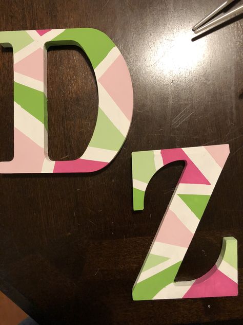 Wooden sorority letters simple design Painting Sorority Letters, Delta Zeta Letters Painted, Painting Wooden Letters Designs, Sorority Letters Painted Wooden Easy, Wooden Letter Painting Ideas Design, Painted Greek Letters Wooden, Dz Letters Painted, Painted Sorority Letters Wooden, Wood Letters Decorated Painted