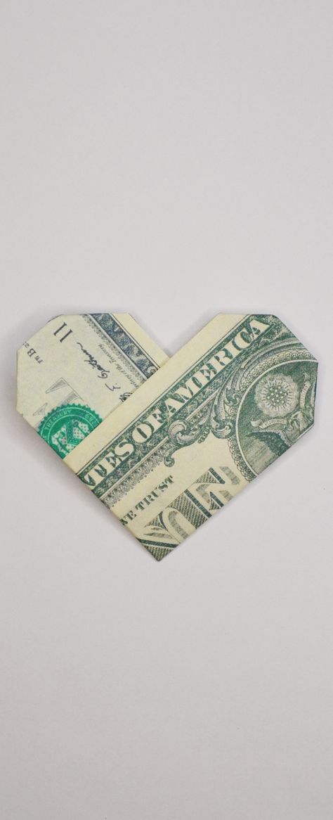 The money heart is an easy origami out of one dollar bill. Without using glue or tape. It's a nice gift for Valentine's day! Do you like this origami? I wish you a pleasant viewing! Subscribe to my channel! Paper Hearts Origami Aesthetic, Dollar Bill Heart How To Make, Money Origami Easy Numbers, Orgamini Money, Money Heart Origami How To Make, Money Origami Heart Step By Step, How Do You Make A Heart Out Of Money, Money Heart Aesthetic, 5 Dollar Bill Origami