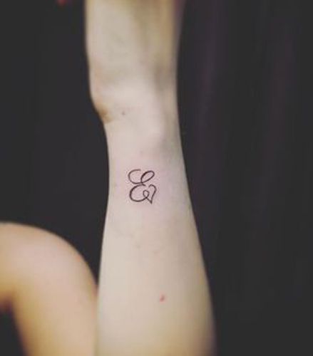 Expressive E Letter Tattoo E Letter Tattoo, Tattoo Ghost, Fonts For Tattoos, Meaningful Wrist Tattoos, E Letter, Monogram Tattoo, Letter Tattoo, Initial Tattoo, Pretty Tattoos For Women