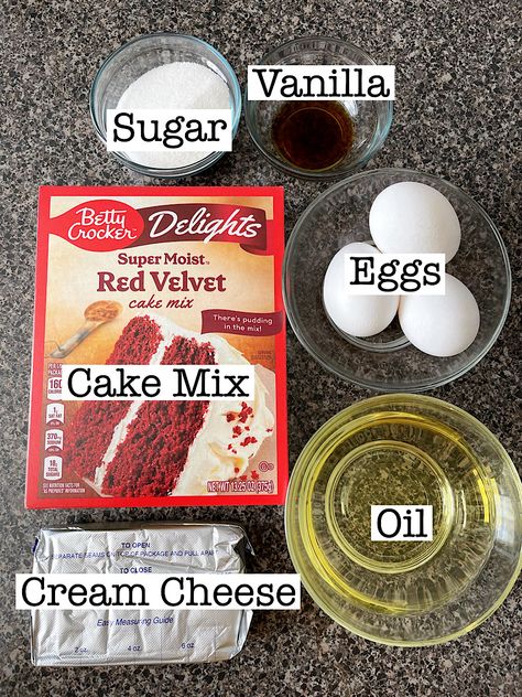 Get the best of both worlds with these red velvet brownies. Made with a cake mix and topped with a creamy cheesecake layer, they're the ultimate indulgence! Red Velvet Cheesecake Swirl Cake, Red Velvet Cheesecake Cupcakes From Box Cake Mixes, Red Velvet Cake Mix Cheesecake, Red Velvet Cheesecake Brownies Easy, Red Brownies Velvet, Red Velvet Cheesecake Brownies From Box Cake Mixes, Red Velvet Brownies Cake Mix Easy, Red Velvet Cupcakes From Box Cake Mixes Easy Recipes, Red Velvet Cake Mix Recipes Easy