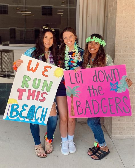 Hawaiian Theme Homecoming, Beach Day Pep Rally Outfit, Beach Football Posters, Pool Party Student Section Theme, High School Sports Game Themes, Hawaiian Cheer Signs, Hawiann Theme Football Games, Beach Cheer Theme, Beach Theme Football Game Posters