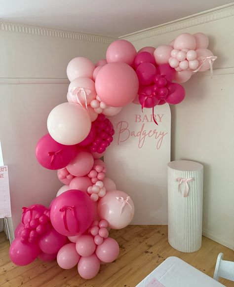 Baby Badgery 🩷🎀 1st Birthday Arch Backdrop, Pink Backdrop With Balloons, Pink Balloon Arch 1st Birthday, Ballon Ideas, Coquette Balloon Arch, Coquette Birthday Party Decorations, Pink Arch Backdrop, Pink Party Theme Ideas, Pink Bow Balloon Arch