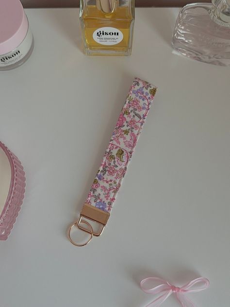 Handmade wristlet Measurements: 6 x 1 inches Gold Hardware Pink floral fabric  100% cotton Floral Keychain, Pink Floral Fabric, Handmade Wristlet, Surf Jewelry, Aesthetic Girly, Pink Wristlet, Keychain Wristlet, Wrist Lanyard, Handmade Keychain