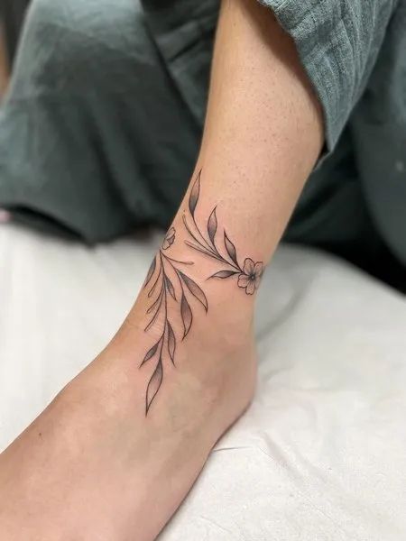 Ankle To Foot Tattoos For Women, Wrist Floral Tattoo, Ankle Floral Tattoo, Black And White Floral Tattoo, White Floral Tattoo, Ear Floral Tattoo, Watercolor Floral Tattoo, Floral Ankle Tattoo, Vine Foot Tattoos