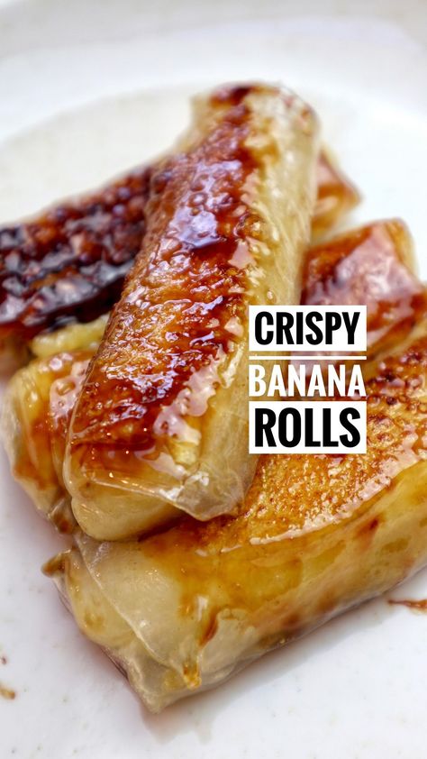 Crispy Banana Rolls Recipe https://fooooods.com/crispy-banana-rolls-whenmeateatsveg Fruit Spring Rolls, Banana Rolls, Rice Paper Spring Rolls, Banana Spring Rolls, Banana And Rice, Ripe Banana Recipe, Banana Roll, Spring Roll Wrappers, Banana Dessert Recipes