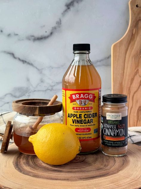 This hot apple cider vinegar detox drink is robust and comforting. Made with apple cider vinegar, lemon, honey and cinnamon for a flavorful warm tea. Skip the chill with a spicy-sweet ACV tea! #applecidervinegardrink #hotapplecidervinegartea #acvtea #acvdrink Vinegar Drinks Apple Cider, Detox Apple Cider Vinegar Drinks, Apple Cider Vinegar Tea Sore Throat, Apple Cider Vinegar Cold Remedy, Apple Cider Vinegar And Tumeric, Keto Apple Cider Vinegar Drink, Apple Cider Vinegar For Flat Tummy, Acv Tea For Cold, Acv Tea