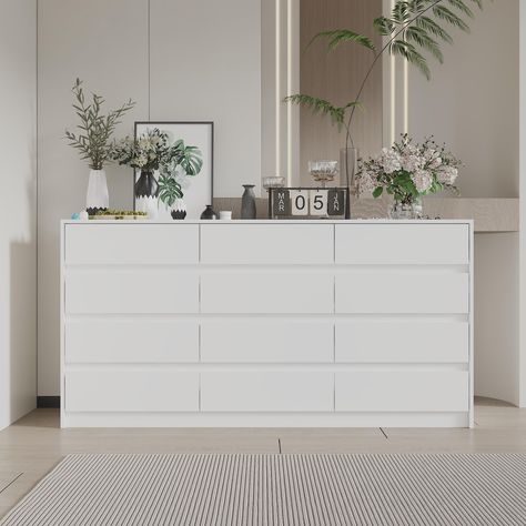 PRICES MAY VARY. [Stylish Design] – Hitow dresser chest comes with sleek design. White surfaces with no extra decoration build an atmosphere of understated elegance for your room. Handleless design adds further sense of uniqueness. Thanks to the modern and simple design, it’ll match with different furnishing styles perfectly. Overall Dimensions: 63”L x 15.7”W x 31.9”H [Sufficient Storage] - This double dresser features 12 drawers to meet your storage needs in living room. The drawers in differen Big Dresser, Dresser Decor Bedroom, 12 Drawer Dresser, Drawers Design, Large Chest Of Drawers, Easy Room Decor, Dresser For Bedroom, Dresser Chest, White Dresser