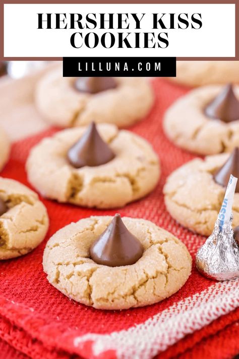 Hershey Kiss cookies are soft, chewy peanut butter cookies topped with a tasty chocolate kiss! It's a best-loved simple cookie recipe. #peanutbuttercookies #kisscookies #cookies #peanutbutter #hersheyskiss Peanut Butter Hershey Kiss Cookies, Peanut Butter Kiss Cookies Recipe, Bisquick Cookies, Peanut Blossom Cookies, Simple Cookie Recipe, Kiss Cookie Recipe, Chocolate Kiss Cookies, Hershey Kiss Cookies, Peanut Butter Kiss