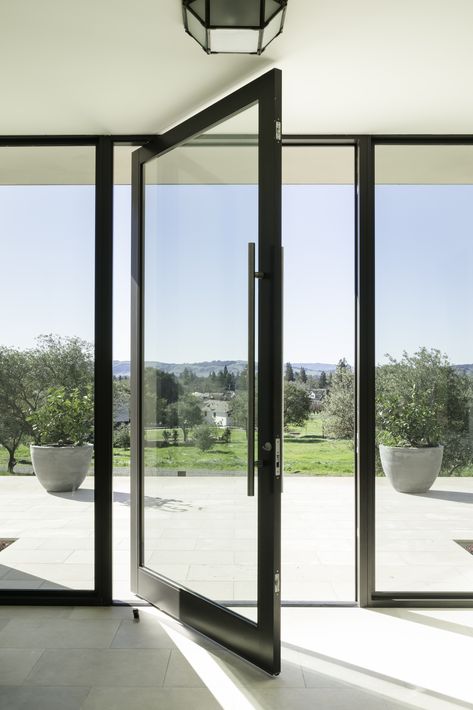 Glass Doors Exterior Entrance, Black Glass Entrance Door, Aluminum Front Door Modern, Modern Glass Entry Door, Big Glass Doors Entrance, Glass Pivot Front Door, Glass Pivot Doors Entry, Aluminum Windows Modern, Pivot Doors Entry Modern