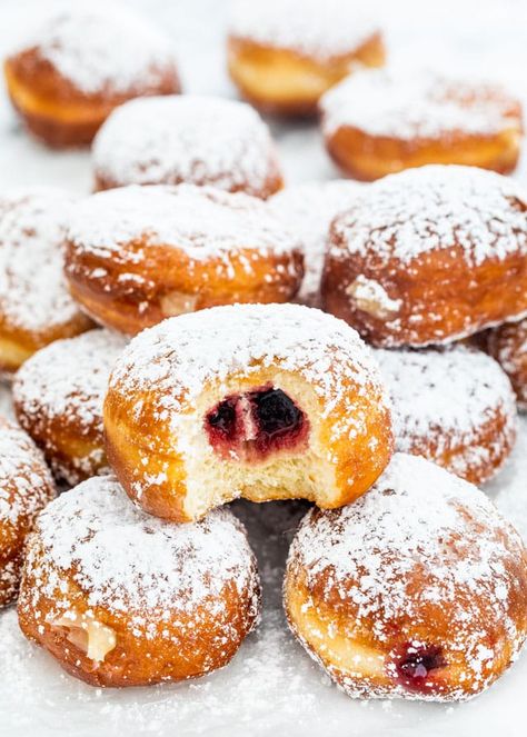 These homemade Paczki are soft, pillowy delectable morsels filled with jam, custard or lemon curd! Paczki are traditional Polish donuts, popular on Fat Tuesday aka Mardi Gras.  #paczki Homemade Paczki, Paczki Recipe, Magical Desserts, Fried Pastries, Polish Donut, Jacob Kowalski, Mardi Gras Desserts, Polish Desserts, Fried Donuts