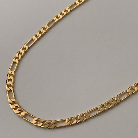 The classic Figaro chain comes in 14k Gold Filled suited for unisex styling. Length: 21.6" x 5mm Care Store jewelry in microfiber Club Paradiso pouch. To clean, use microfiber pouch to wipe away dirt and oil buildup. Avoid contact with chemicals (lotions, perfumes, etc) to prevent fading. Material 14k Gold Filled Copper RETURNS Although we do not accept returns. We will make an exception on case by case. Please inspect orders as soon as they arrive to ensure any defectives, damage or incorrect i Male Chain Design, Latest Gold Chains For Men, Gold Chain For Man, Gold Chain Mens Design, Man Gold Chain Design, Mens Gold Chain Necklace Style, Gold Chain For Men Design, Mens Gold Chain Design, Gold Chain Design Men