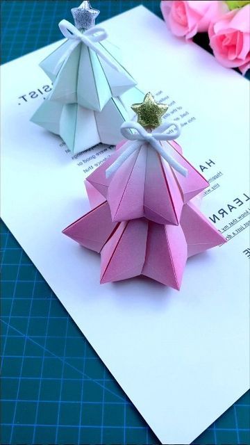 paper crafts creator on Instagram: "Simple and beautiful origami Christmas tree, fold it for the person you like. #Handmade #Origami #Christmastree #Handmade #diy #Origami #tutorial paper craft ideas" Easy Christmas Diy Crafts, Folded Paper Christmas Tree, Origami Xmas, Christmas Tree Paper Craft, Origami Christmas Ornament, Craft Ideas Paper, Diy Paper Christmas Tree, Origami Christmas Tree, Beautiful Origami