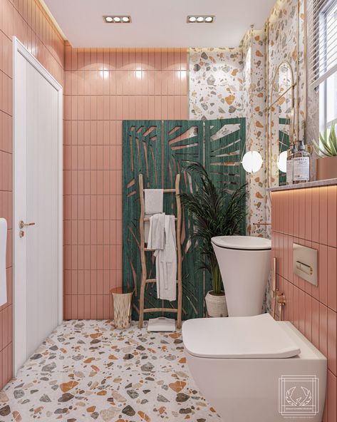 This beautiful space has soft pink tiles and colorful terrazzo flooring, providing a dynamic and friendly environment. The green accent wall offers a refreshing touch, while natural features such as the wooden ladder and plants provide a hint of nature.
#moderninterior  #peachinterior #Peachbathroom #cheerfulbathroom #modernBathroom #creativeBathroomDesign #summerVibes #uniqueBathroom #BathroomRedesign  #ColorfulInteriors #PlayfulDecor #TerrazzoLove Pistachio Bathroom Ideas, Bathroom Peach Color, Pink And Green Toilet, Bathroom With Terrazzo Floor, Peach Tiles Bathroom, Peach Green Bathroom, Peach And Green Interior, Peach Colored Bathroom, Peach And Green Bathroom