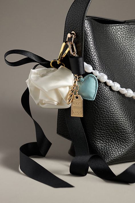 Charming new-trend alert: jewelry for your bag, featuring a long pearl chain to extend across your bag. | Pearl Chain Bag Charm by Anthropologie in White, Women's, Brass/Resin