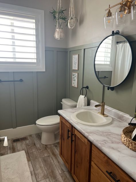 Board And Batten Mirror, Sage Green Board And Batten Wall Bathroom, Board And Batten Wall Behind Freestanding Tub, Wood Paneling Makeover Bathroom, Board And Batten Bathroom Mirror, Small Board And Batten Bathroom, Sage Green Board And Batten Bathroom, Small Bathroom Ideas Board And Batten, Board And Batten Bathroom With Window