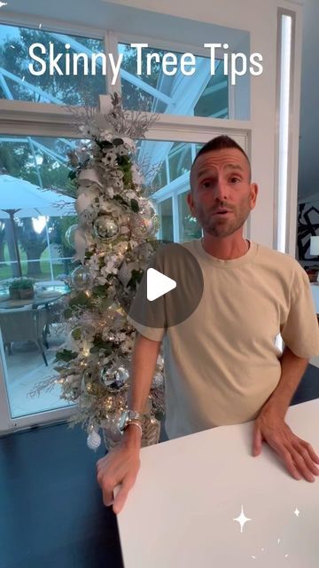 Jesse Cooper on Instagram: "SKINNY TREE TIPS - Don’t make your skinny tree look like a pretzel stick! 🤣🤣🤣🤣 Seriously all of a sudden you’re gonna start clocking this all over the place. Skinny trees are still a Christmas tree. So they should maintain that triangle shape. I notice a lot of times when someone is decorating a skinny tree they get a little out of control with the tree topper and all of a sudden the tree topper is bigger than the base of the tree. You can do whatever you want, but in my opinion, what makes a skinny tree look so amazing is when the shape is honored. There are larger ornaments at the bottom and it cascades to smaller ornaments at the top. Also add longer picks for texture. And when a skinny tree is put in a container, well there something about a skinny tree 3 Pencil Christmas Trees Together, Small Silver Christmas Tree Ideas, Birch Tree Christmas Decorations, Decorated Slim Christmas Trees Ideas, Male Christmas Tree Ideas, Foyer Christmas Trees, In What Order Do You Decorate A Christmas Tree, Narrow Christmas Trees, How To Raise Christmas Tree Height