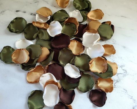 "Your Western Rustic Fall flower petal set will include stunning Brown, Olive Green, Beige and Taupe rose petals. You can choose to add ivory and beige flower petals to the mix. Our gorgeous rose petals are perfect for flower girl tossing, ceremony decor, tabletop scattering or used as wedding aisle decor. We several styles and color combinations that you can customize by adding additional colors or omitting a color/s. This allows you to create a Perfect set that is unique for you on your Special Day! CLICK HERE: to view more Olive Green Petals https://www.etsy.com/shop/GraceReneeElegance?ref=profile_header&search_query=olive Your rose petals are ideal for: * Flower Girl Tossing * Wedding Aisle Decor * Cake, wedding memorial tabletop scatter  * Ceremony Decor / Sweetheart table decor * Bri Beige And Olive Green Wedding, Rustic And Green Wedding, Wedding Colors Brown And Green, Sage Green Cream And Brown Wedding, Wedding Colors With Olive Green, Sage Green Brown And Gold Wedding, Sage Green And Brown Party Decorations, Olive Green And Ivory Wedding Color Palettes, Army Green And Gold Wedding