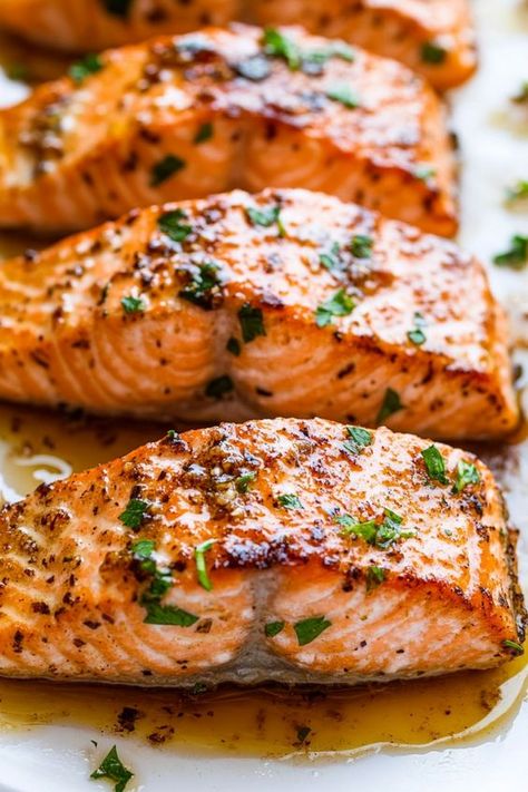 Discover a delicious twist on a classic favorite with our Honey Garlic Salmon recipe. Whether baked, cooked in an air fryer, or prepared in the oven, this dish is bursting with flavor. Try our easy-to-follow recipe for a savory and sweet meal that your whole family will love! Salmon Recipes Baked Oven, Healthy Baked Salmon Recipes, Whole Salmon Recipe, Oven Baked Salmon Recipes, Salmon Recipes Oven, Oven Salmon, Baked Fish Fillet, Salmon Recipes Baked Healthy, Zone Recipes