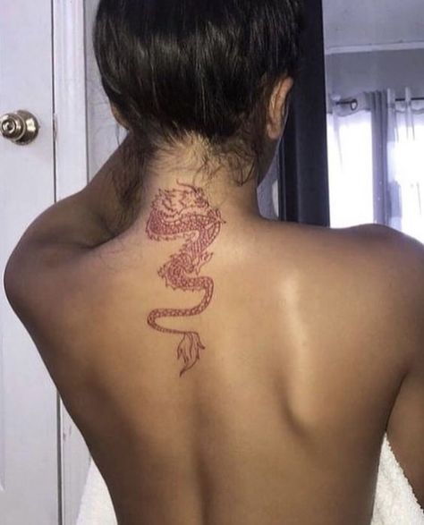 Red inked dragon tattoo on the nape of the neck down the spine | www.otziapp.com Tricep Tattoos, Tato Minimal, Band Tattoos, Dragon Tattoo For Women, Snakebites, Ribbon Tattoos, Tattoo Zeichnungen, Cat Tattoos, Inspiration Tattoos