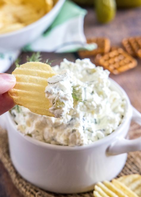 Creamy dill pickle dip is briny, cool, and crunchy. Made with 5 ingredients in minutes, it's delicious for dipping just about everything! Dill Pickle Dip Recipe, Pickle Dip Recipe, Homemade French Onion Dip, Cream Cheese Spread Recipes, Chip Dip Recipes, Dill Pickle Dip, Ranch Dip Recipe, Pickle Dip, Dill Pickle Chips