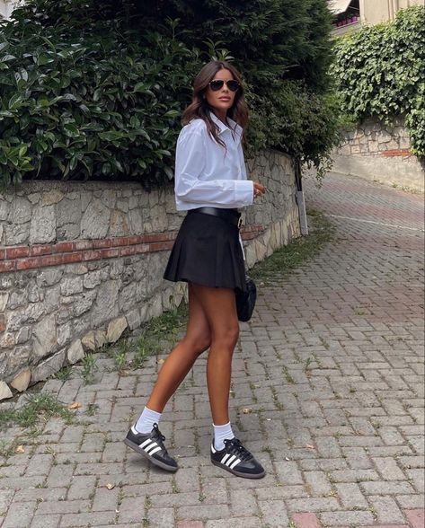 fashion outfits , fashion inspo outfits , fashion , fashion trends 2023 , outfits , outfit ideas summer , outfits aesthetic , outfit inspo summer , aesthetic clothes , ralph lauren , ralph lauren aesthetic , summer outfits 2023 , summer , celine , chanel shoes , chanel aesthetic , chanel looks , hermes aesthetic , hermes looks , looks , lookbook , streetwear fashion , street wear , street style , ootd , fall aesthetic , fall outfits , fall looks , hermes purse , hermes inspo , life inspo Black Samba Shoes Outfit, Tennis Skirt Outfit Street Style, Mum Fits, Black Tennis Skirt Outfit, Fall Skirt Outfits, Adidas Samba Women, Fav Outfit, Black Tennis Skirt, Adidas Samba Outfit