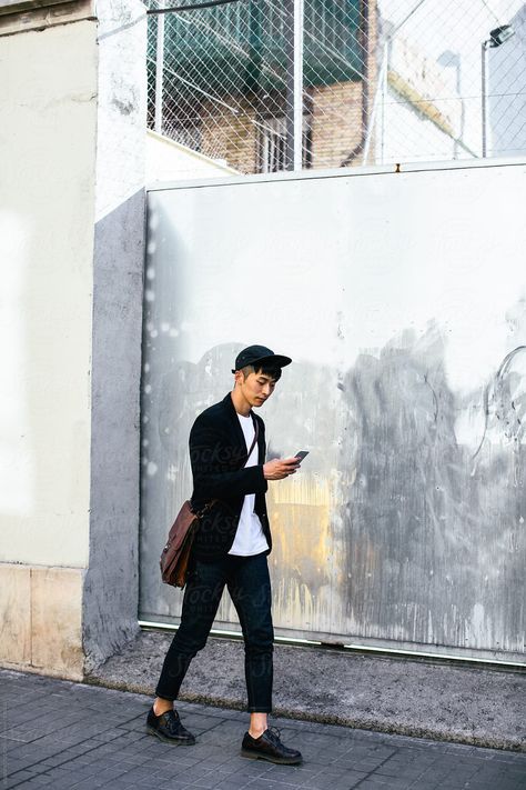 Stylish Asian Businessman Using Phone Walking On The Street. by BONNINSTUDIO Walking With Phone Reference, People Walking Down The Street, Walking References, Guy On Phone, References Photography, Walking Reference, People Walking Street, Street Fashion Shoot, Guy Walking