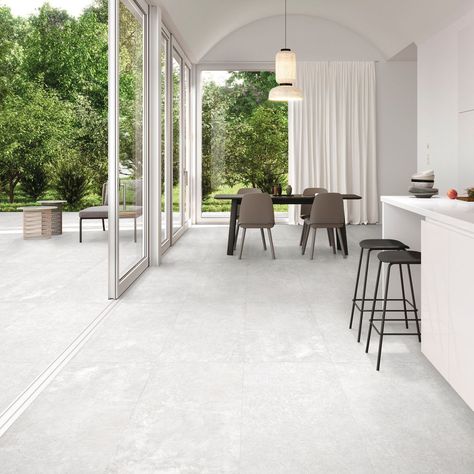 Add a splash of minimalist sophistication with your flooring thanks to Grange Blanco; a durable large-format porcelain floor tile that faithfully replicates white brushed concrete. Exuding understated elegance from every last millimetre, Grange brings the pared-back industrial aesthetics of brushed concrete, without the upkeep, to large format porcelain tile form that is equally at home in interior settings as it is in exterior designs. The R11 anti-slip rating and rectified edges ensure a safe Brushed Concrete, Outdoor Tiles Floor, Tiles Floor, Luxury Tile, Wood Tile Floors, Large Tile, Large Format Tile, Concrete Tiles, Porcelain Floor