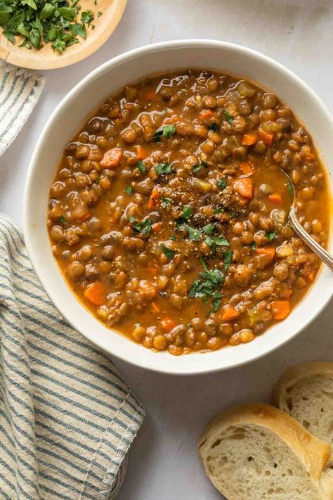 This slow cooker lentil soup is super easy to make and can last all week. It's delicious and hearty, making it perfect for fall and winter. Instant Pot Lentil Soup, Best Lentil Soup Recipe, Slow Cooker Lentil Soup, Lentil Vegetable Soup, Carrot And Lentil Soup, Little Sunny Kitchen, Slow Cooker Lentils, Vegan Lentil Soup, Sunny Kitchen