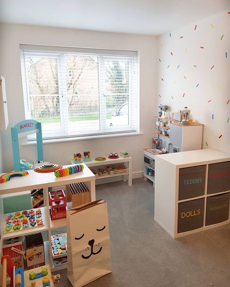 Playroom Ideas Trofast, Playroom With Different Areas, Toy Set Up Ideas, Living Room Play Corner Small Spaces, Dining Room And Playroom, Playroom For Small Spaces, Playroom Drawing Area, Small Narrow Playroom Ideas, Room Divider Ideas Playroom