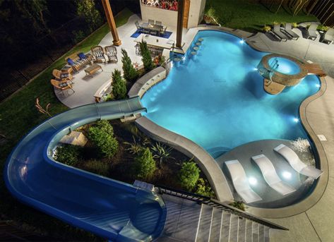 Swimming pool with a slide idea for the backyard. | 11 of the Best Backyard Swimming Pools We've Ever Seen Swimming Pool Slides, Swimming Pool Design Ideas, Big Swimming Pools, Dream Backyard Pool, Pool Design Ideas, Swimming Pool Design, Big Pools, Big Backyard, Swim Up Bar