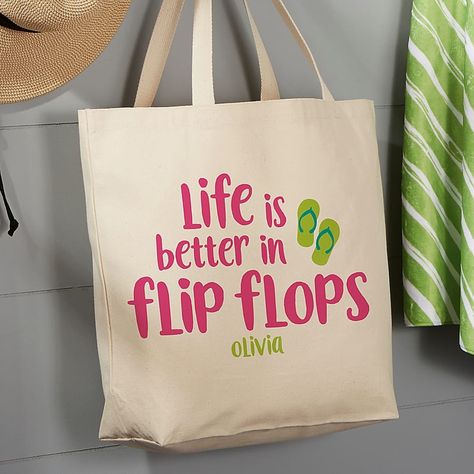 Personalizationmall "life Is Better In Flip Flops" Tote Bag In Tan - Easily bring your gear to the beach or pool with the "Life Is Better In Flip Flops" Tote Bag. Lght canvas design is easy to carry and can be personalized with a name of your choice. Convenient straps can be held or thrown over your shoulder. Flip Flop Quotes, Totes Ideas, Personalized Flip Flops, Personalized Canvas Tote, Sublimation Ideas, Pool Bags, Personalized Canvas, Personalized Tote Bags, Personalised Canvas