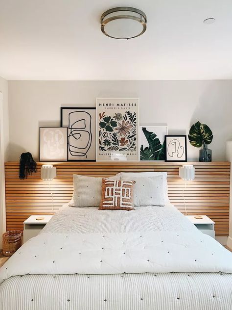 36 Wood Slat Accent Wall Ideas for a Stylish Focal Point in Any Room Art Gallery Wall Bedroom, Northwest Interior Design, Wood Slat Headboard, Wood Slat Accent Wall, Slat Accent Wall, Above Bed Ideas, Wall Behind Bed, Bed With Drawers Underneath, Slat Headboard