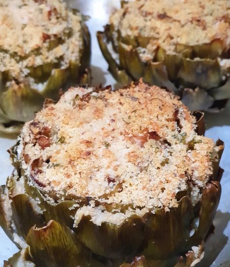 Learn how easy it is to make Sicilian stuffed artichokes, a traditional Italian recipe passed down from my grandmother. Sicilian Stuffed Artichokes, Stuffed Artichoke Recipes Italian, Italian Stuffed Artichokes Recipes, Stuffed Artichokes Italian Bread Crumbs, Stuffed Artichokes Italian, Italian Stuffed Artichokes, Vegetable Entrees, Artichoke Recipe, Stuffed Artichokes