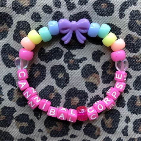 Pastel rainbow Cannibal Corpse band beaded kandi... - Depop Kandi Collar, Gloomy Bear Kandi, Kandi Carousel Cuff, Carousel Cuff Kandi, Gloomy Bear Kandi Cuff, Rave Necklace Kandi, Friendship Symbols, Kandi Bracelets, Kandi Patterns