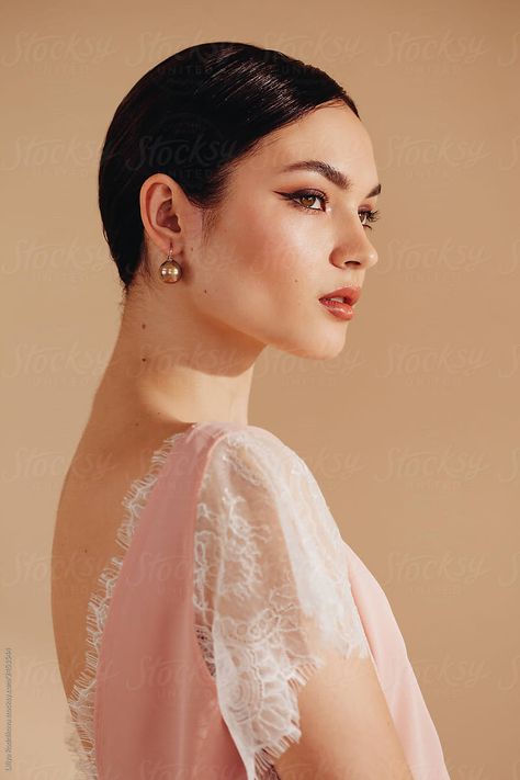 Side view fashion studio portrait of amazing young brunette woman wearing stylish lace clothes and looking away Side View Portrait, Side View Of Face, Woman Looking Down, Charming Woman, Side Portrait, 얼굴 드로잉, Face Drawing Reference, Bun Hairstyle, Human Reference