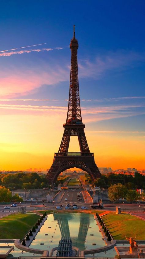 The Eiffel Tower is a wrought-iron lattice tower on the Champ de Mars in Paris, France. Efile Tower Wallpaper Paris France, Menara Eiffel Aesthetic, Effelle Tower Aesthetic, Eifell Tower Pictures, Ifill Tower Paris France, Paris Eiffel Tower Aesthetic, Efile Tower, Effile Tower, Eiffel Tower Aesthetic