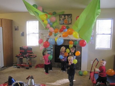 New Year’s Eve with the Kids: Fun Activities to Ring in the New Year! | Saving by Design Diy Balloon Drop, New Years Eve Traditions, Kids New Years Eve, New Years Eve Day, Balloon Games, Balloon Drop, Diy Balloon, New Year's Crafts, Balloon Diy