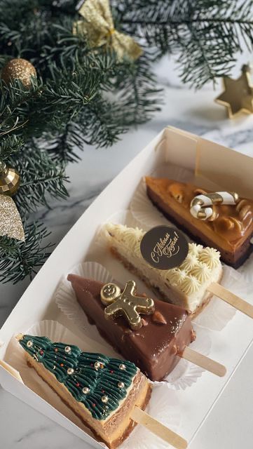 New Year Bakery Ideas, Christmas Cakes 2023, Christmas Loaf Cakes Gift Packaging, Christmas Bakery Decor, Christmas Treat Boxes Sweets, New Year Table Food, Nutcracker Cakes, New Year Cake 2024, Cheesecake Dessert Ideas